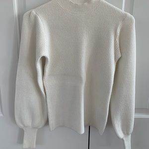 Really cute and fashionable white sweater!
